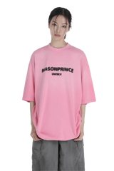 Masonprince 2.0 Faded Logo Gradient Tee in pink worn by model with gray pants unisex style