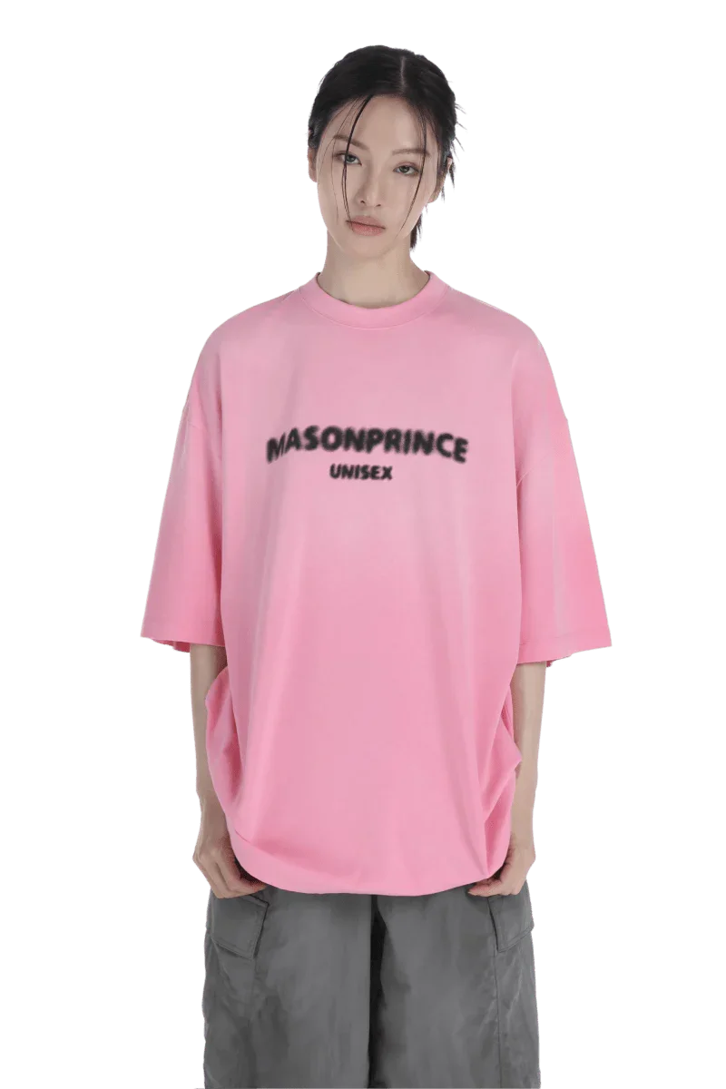Masonprince 2.0 Faded Logo Gradient Tee in pink worn by model with gray pants unisex style