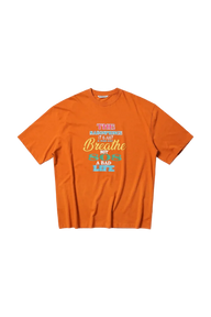 Orange Masonprince 808 Breathe Tee with motivational graphic text on front