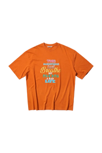 Orange Masonprince 808 Breathe Tee with motivational graphic text on front