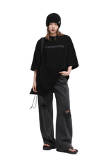 Masonprince Basic Logo Tee in Black, stylish oversized fit paired with relaxed jeans