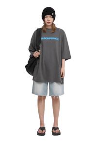 Masonprince Basic Logo Tee in gray with bold blue text, paired with denim shorts and sandals
