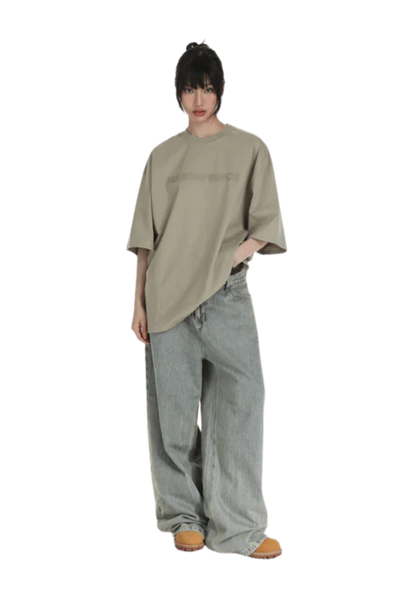 Masonprince Basic Logo Tee in Beige with a relaxed fit, paired with loose-fitting denim jeans
