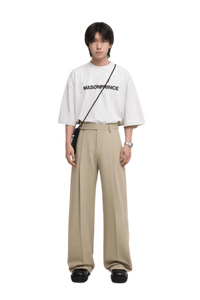 Masonprince Basic Logo Tee in White, styled with relaxed trousers for a trendy outfit