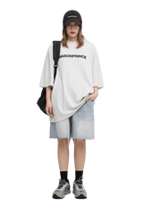 Masonprince Basic Logo Tee in White, styled casually with denim shorts and a cap for a trendy look