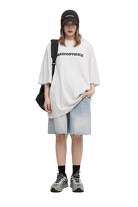 Masonprince Basic Logo Tee in White, styled casually with denim shorts and a cap for a trendy look