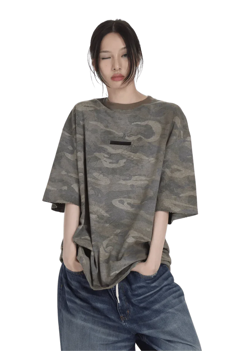 Masonprince camouflage tee worn by model with loose fit and short sleeves paired with blue jeans