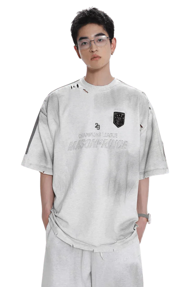 Masonprince Champion League Tee white oversized distressed t-shirt with black emblem worn by model
