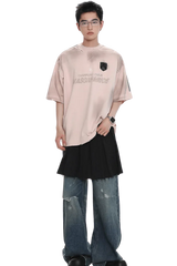 Model wearing Masonprince Champion League Tee in light pink with black patch and casual oversized fit
