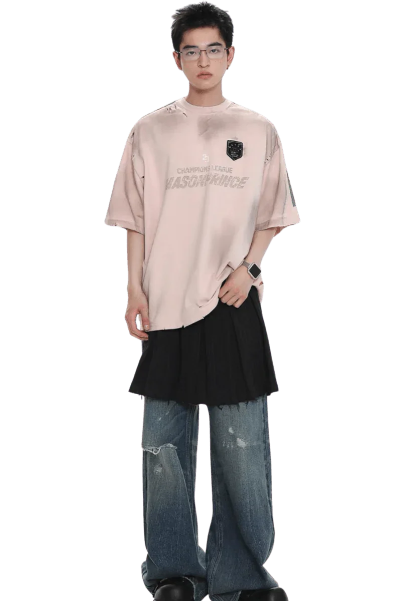 Model wearing Masonprince Champion League Tee in light pink with black patch and casual oversized fit