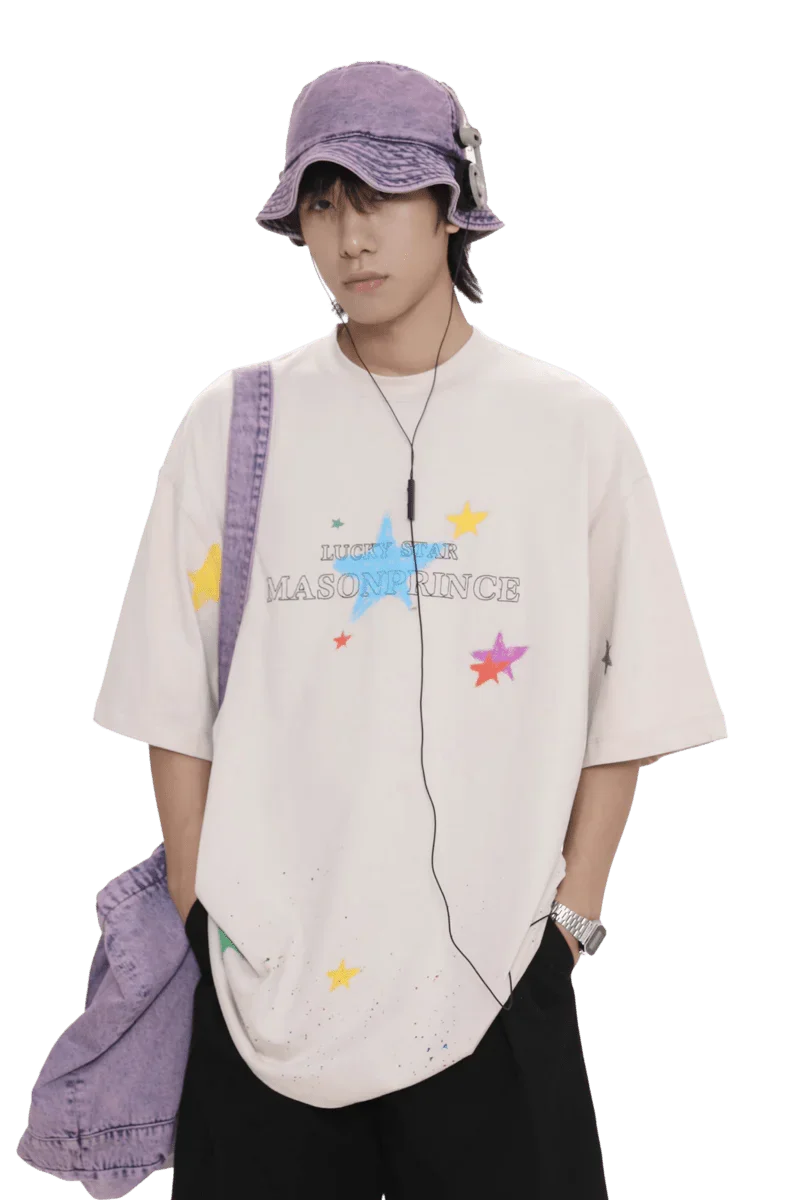 Masonprince colorful star tee worn by male model with purple bucket hat and bag