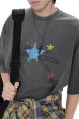 Masonprince colorful star tee in faded black with multicolor star graphics and logo text