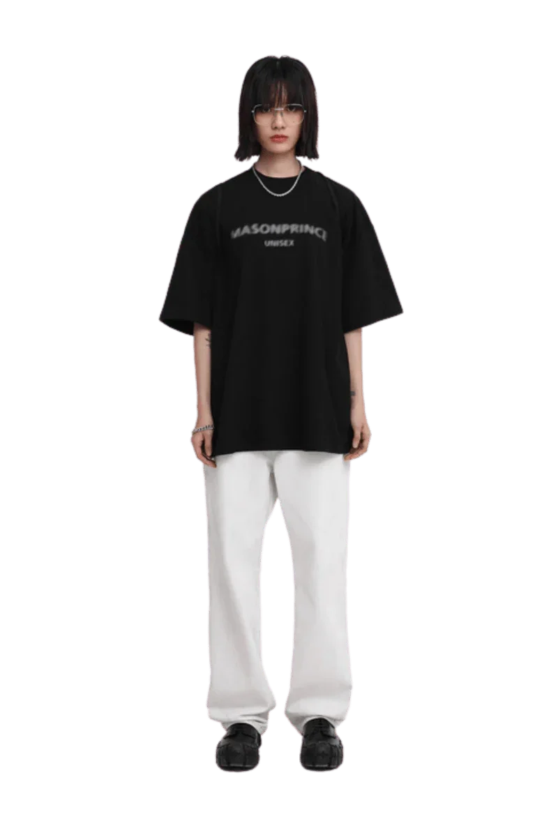 Masonprince Faded Logo Tee in black with casual oversized fit, paired with white pants