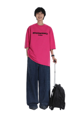 Masonprince Faded Logo Tee in vibrant pink, styled with oversized denim for a trendy look