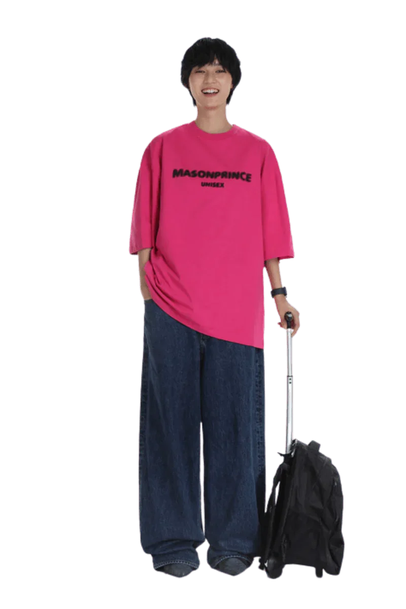 Masonprince Faded Logo Tee in vibrant pink, styled with oversized denim for a trendy look