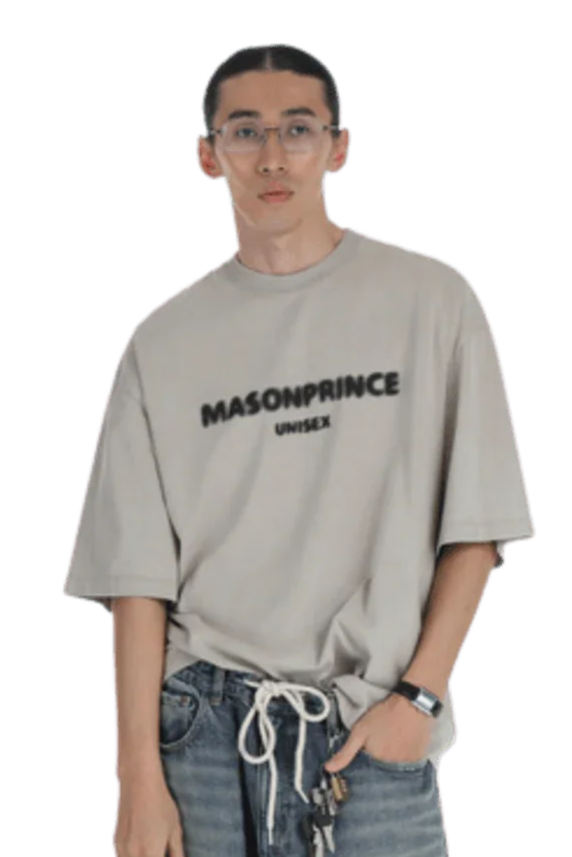 Masonprince Faded Logo Tee in Beige, styled with casual jeans and a green tote bag