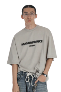 Masonprince Faded Logo Tee in Beige, styled with casual jeans and a green tote bag