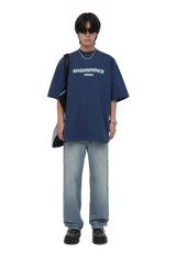 Stylish Masonprince Faded Logo Tee in navy blue, paired with relaxed denim jeans for a trendy look