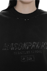 Close-up of black Masonprince Gradient Tee with distressed logo and vintage style text on chest