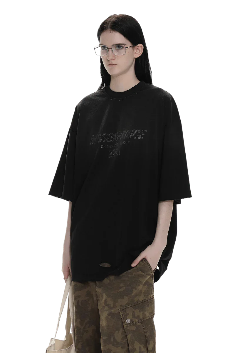 Masonprince Gradient Tee black oversized shirt worn with camouflage cargo pants and glasses