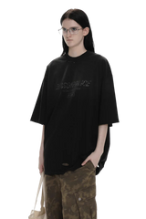 Masonprince Gradient Tee black oversized shirt worn with camouflage cargo pants and glasses