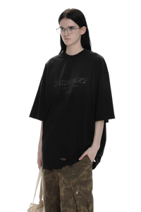 Masonprince Gradient Tee black oversized shirt worn with camouflage cargo pants and glasses