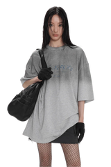 Masonprince Gradient Tee oversized gray t-shirt worn by model with black fishnet stockings and gloves