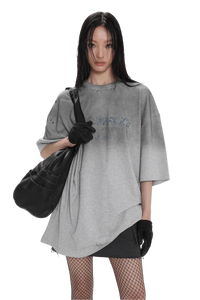 Masonprince Gradient Tee oversized gray t-shirt worn by model with black fishnet stockings and gloves