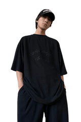 Masonprince Home Embroidery Tee in black, featuring relaxed fit and subtle logo design for casual style