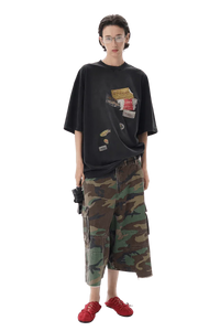 Masonprince patchwork tee black oversized shirt with graphic patches worn with camo cargo pants and red shoes