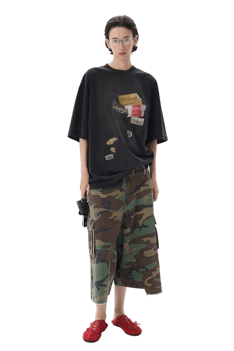 Masonprince patchwork tee black oversized shirt with graphic patches worn with camo cargo pants and red shoes