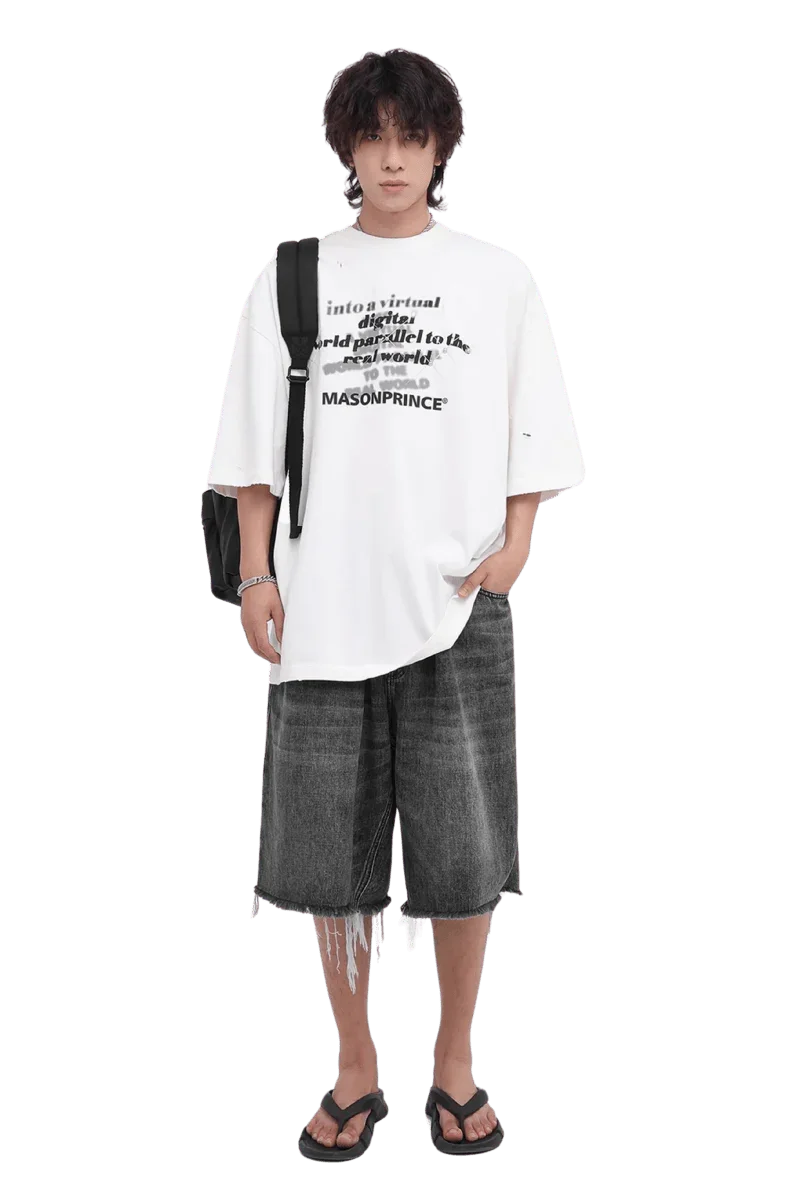Masonprince white Real World Tee with black text worn with gray denim shorts and black sandals