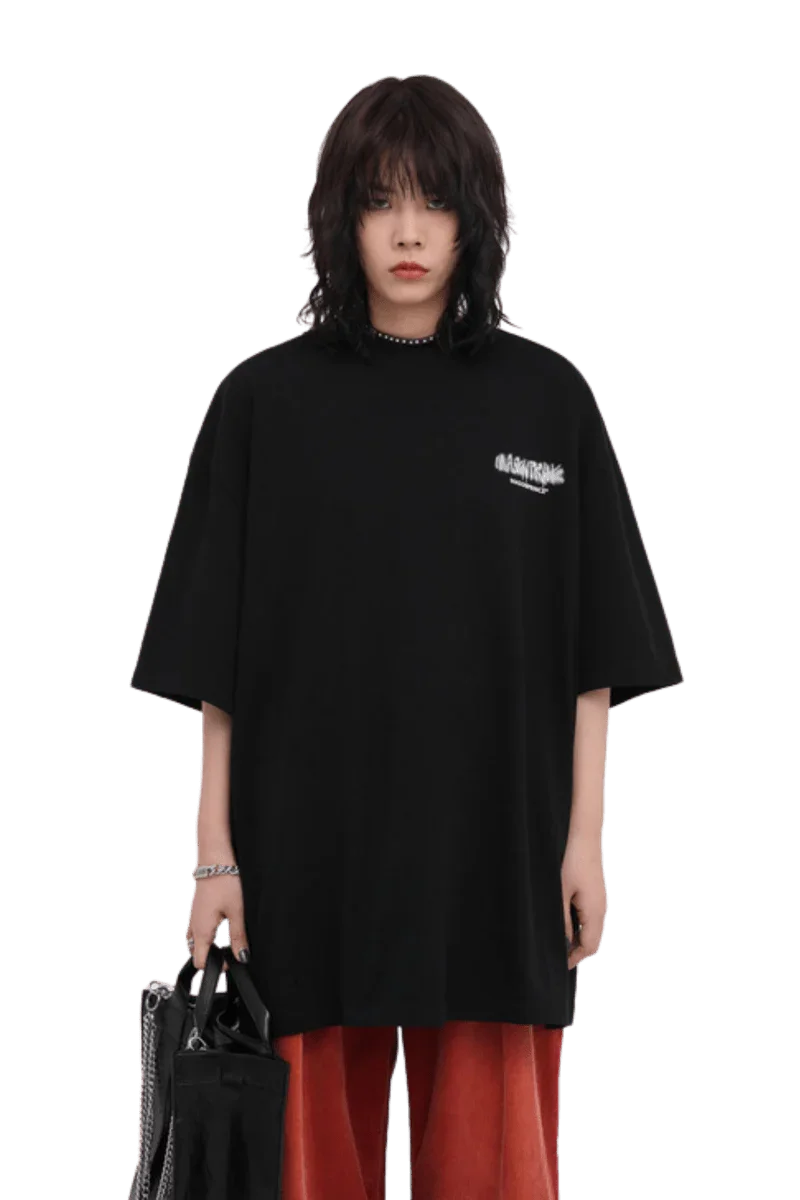 Masonprince Spray Paint Tee in black, featuring a relaxed fit and stylish graphic design