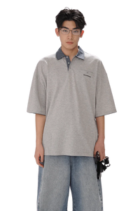 Masonprince SS25 Polo Tee in gray with contrasting patterned collar worn by male model