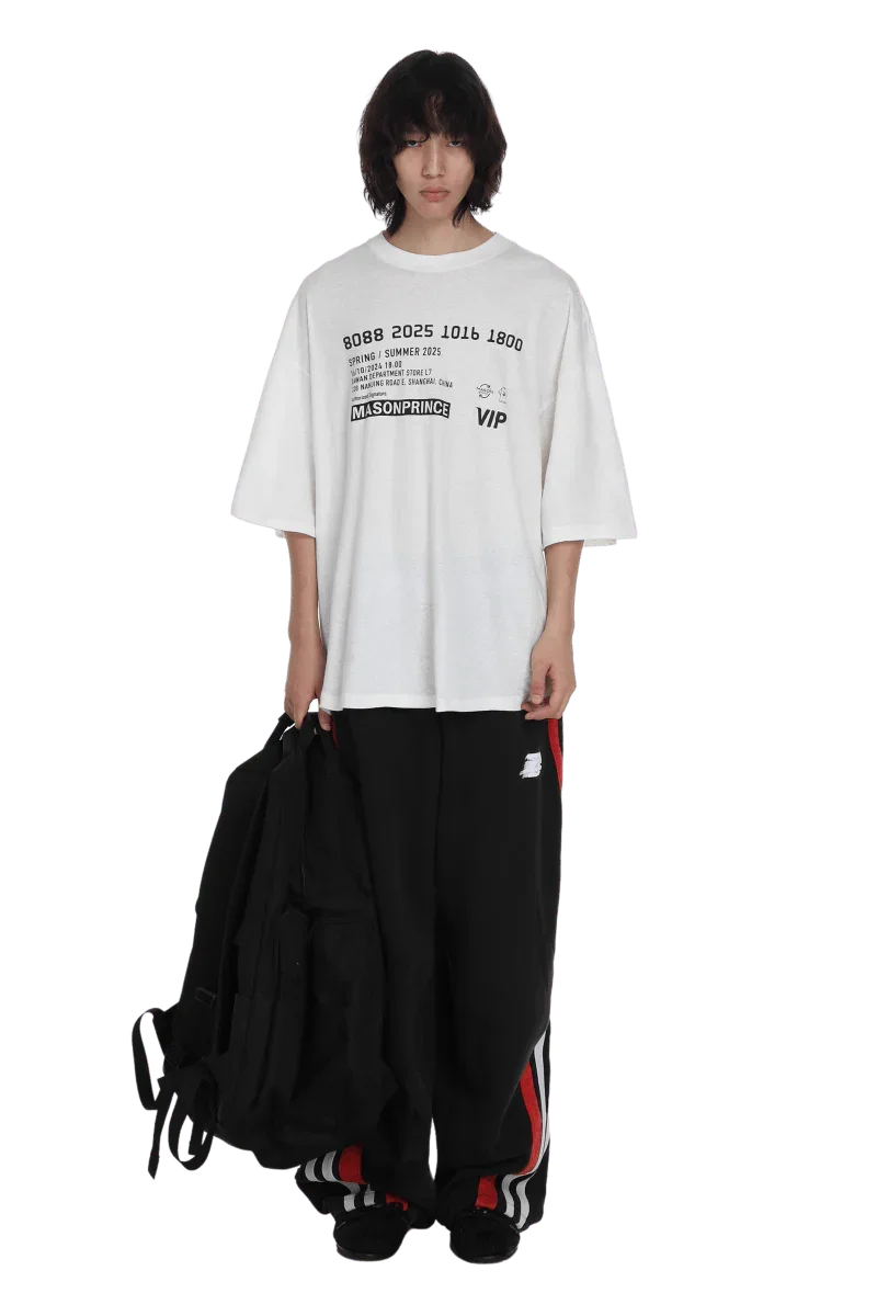 Masonprince SS25 VIP Tee white oversized shirt with black printed text worn by model