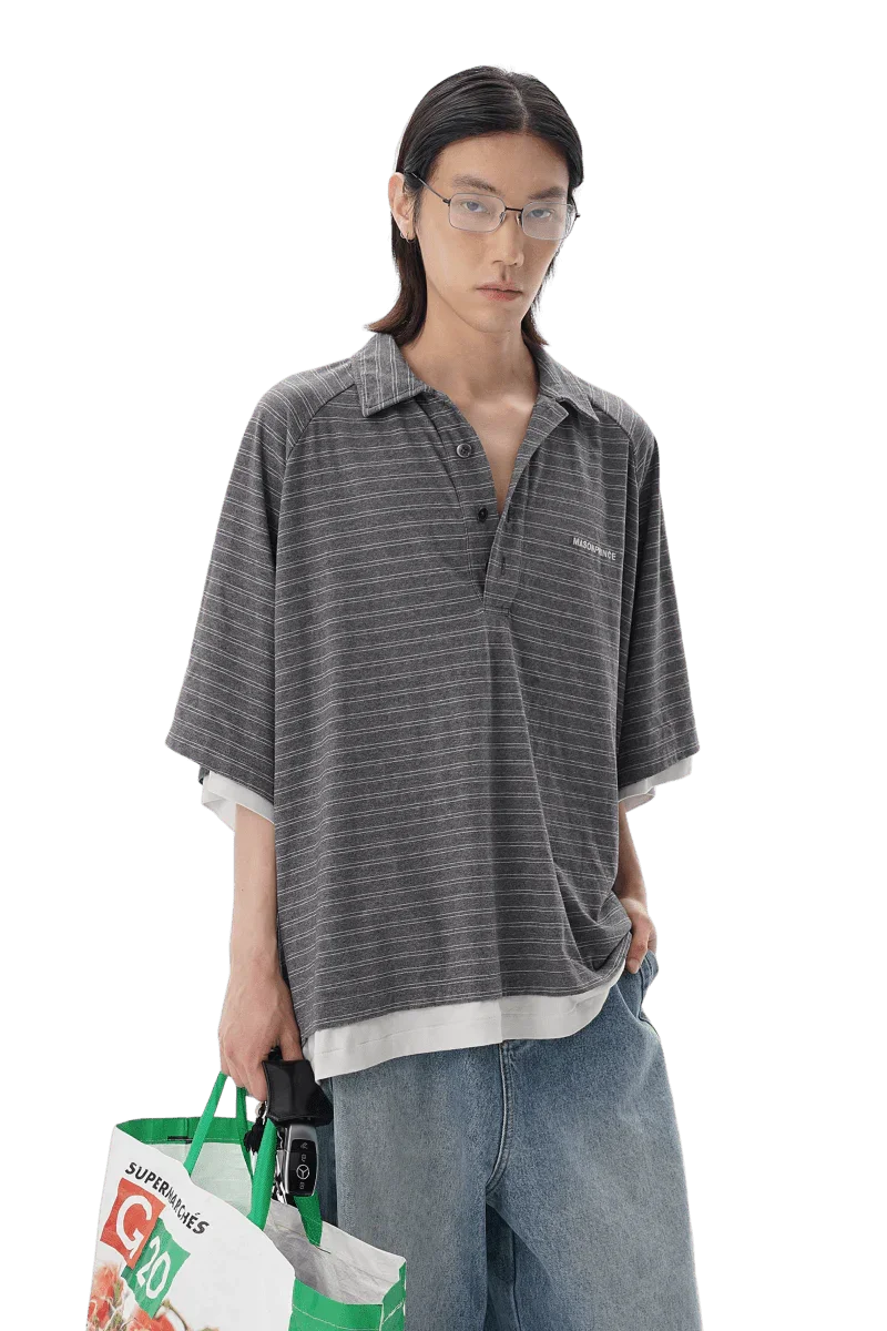 Male model wearing Masonprince Stripes Polo Tee in gray with horizontal stripes and loose fit