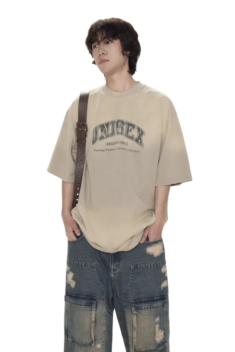 Masonprince unisex logo tee in beige worn with ripped denim jeans and crossbody bag