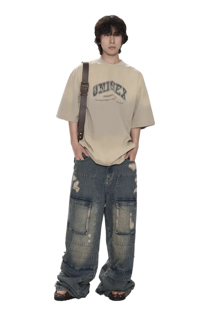 Masonprince unisex logo tee in beige worn with distressed baggy jeans and crossbody strap