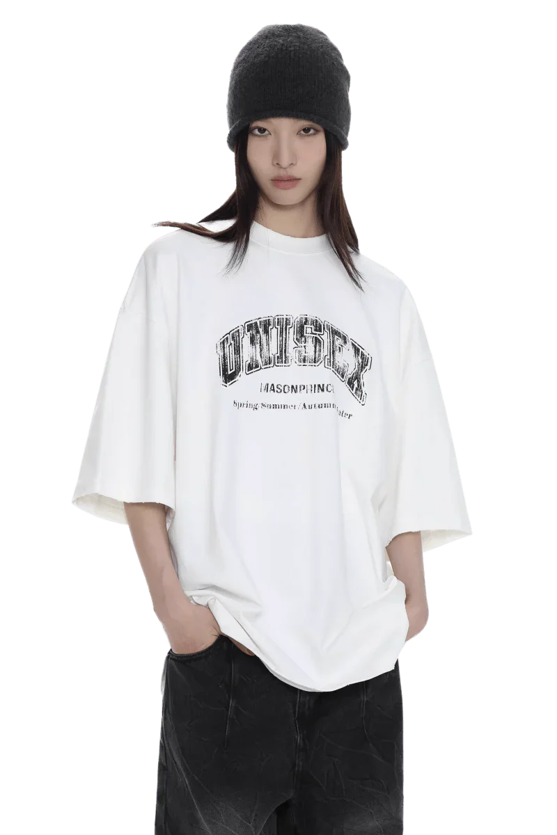 Masonprince unisex logo tee white oversized shirt with black text worn by model with black beanie