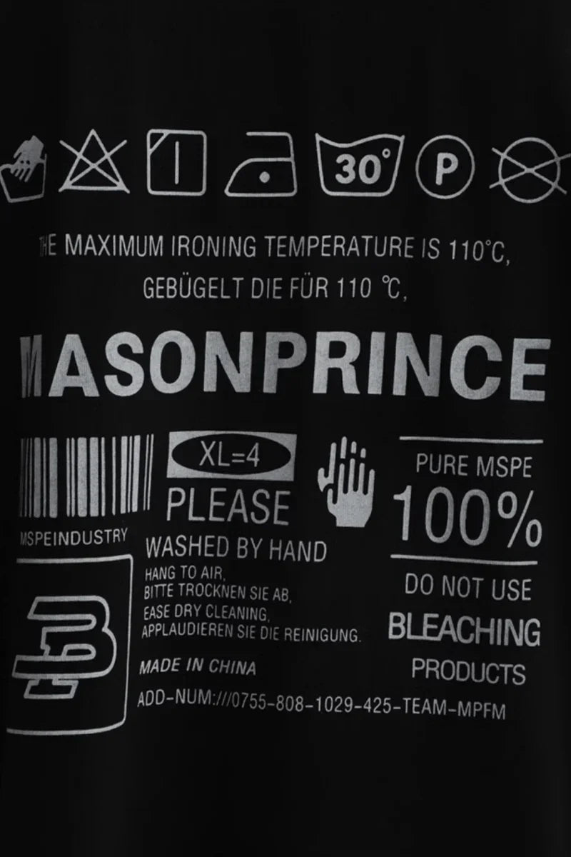 Close-up of Masonprince WashTag Tee label showing washing instructions and fabric details