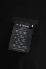 Masonprince WashTag Tee close-up of black fabric tag with care instructions and size 3 label