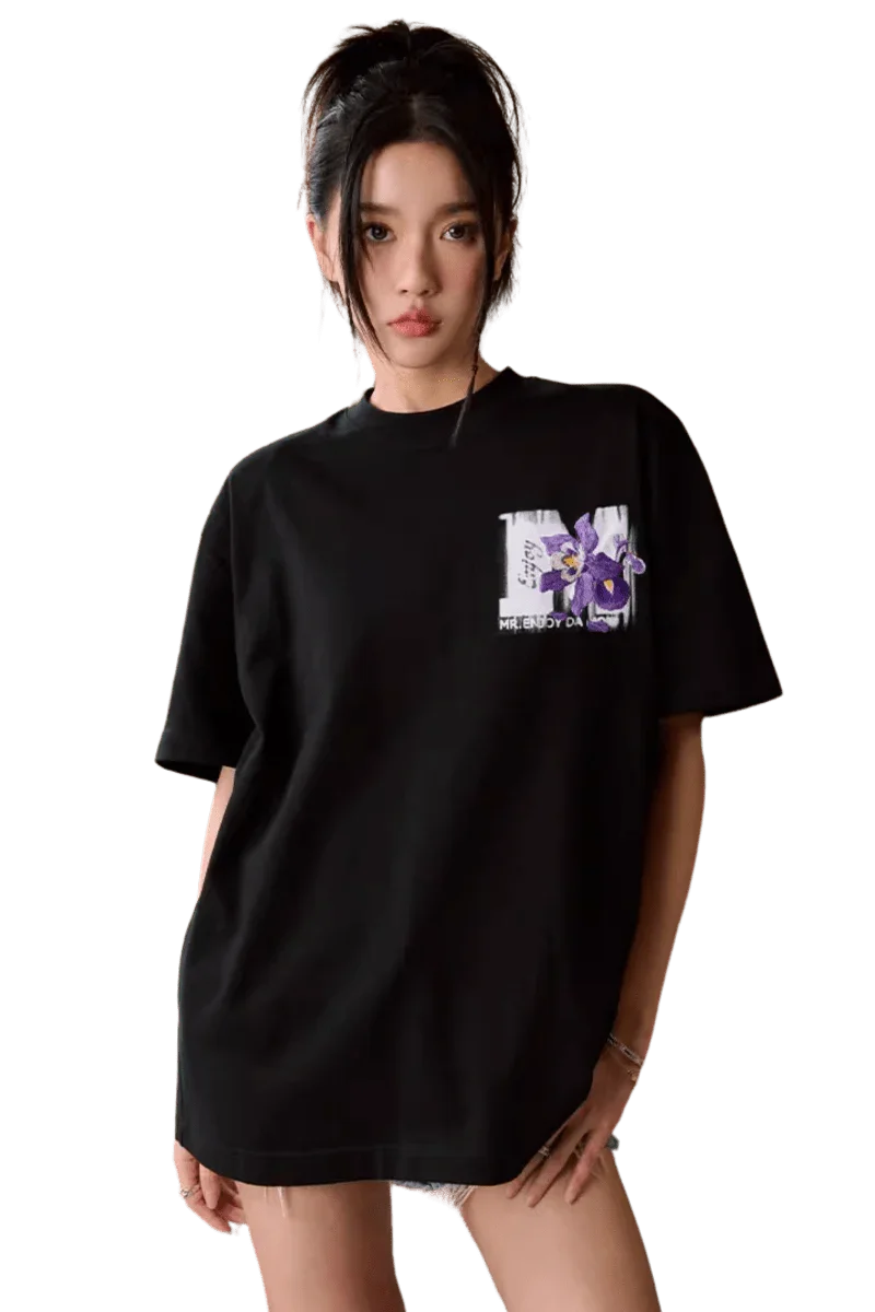 Black MEDM 3D Flower Embroidery Tee featuring vibrant floral design on chest