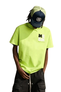 Bright neon green MEDM Badge Tee featuring logo graphic for casual streetwear style