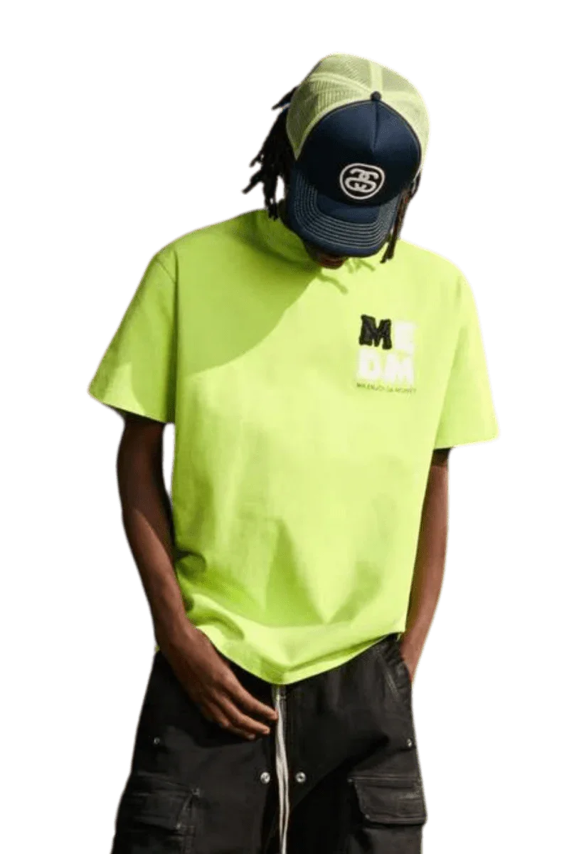 Bright neon green MEDM Badge Tee featuring logo graphic for casual streetwear style