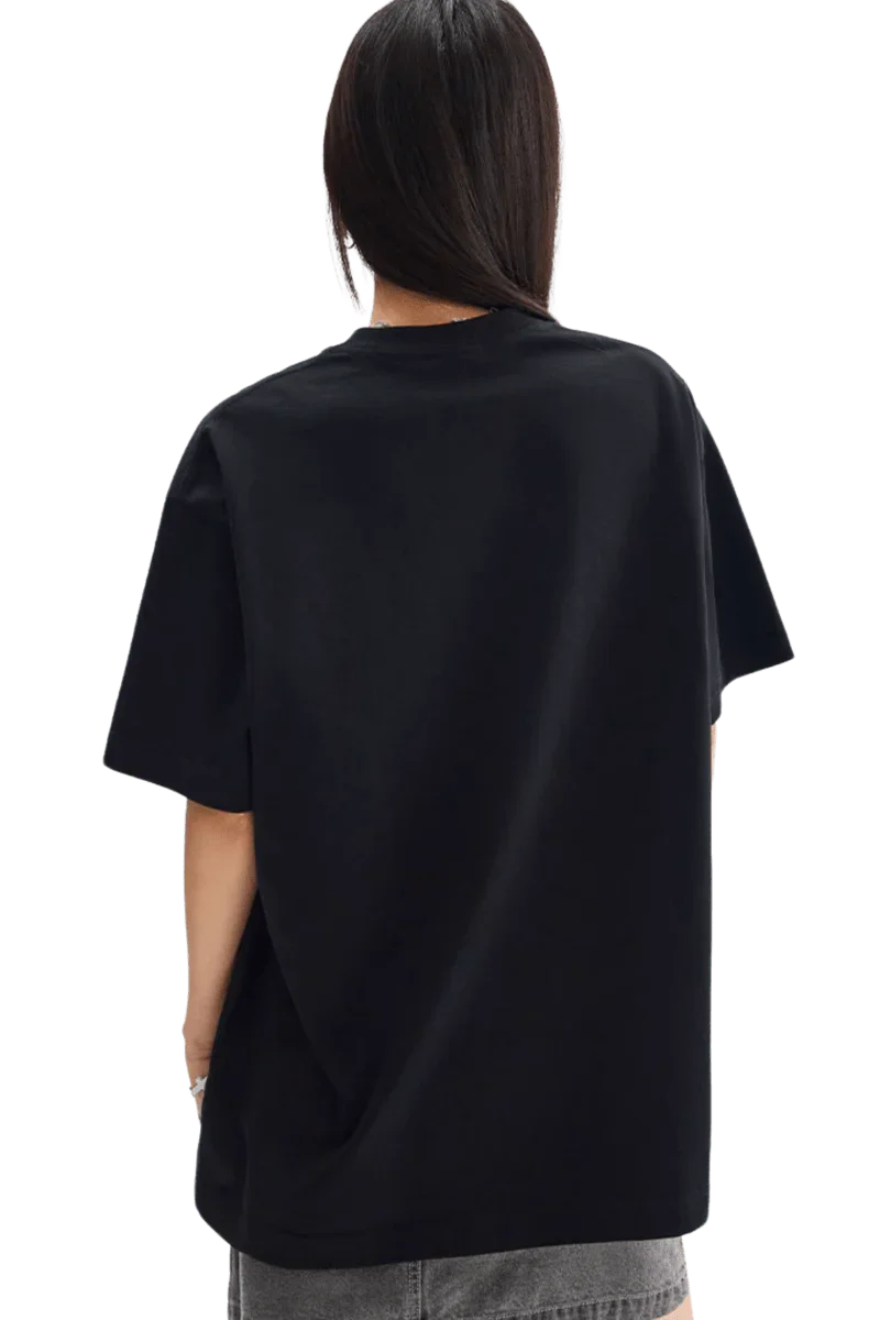 Back view of the MEDM Big M Cookie Tee in black, showcasing its oversized stylish design