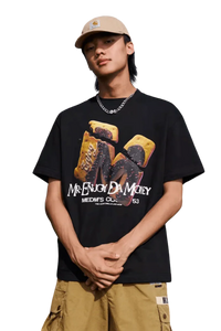MEDM Big M Cookie Tee in black featuring vibrant graphic print by Mr Enjoy Da Money