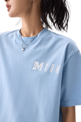 MEDM Building Colour Block Tee in light blue, featuring unique logo design for casual wear