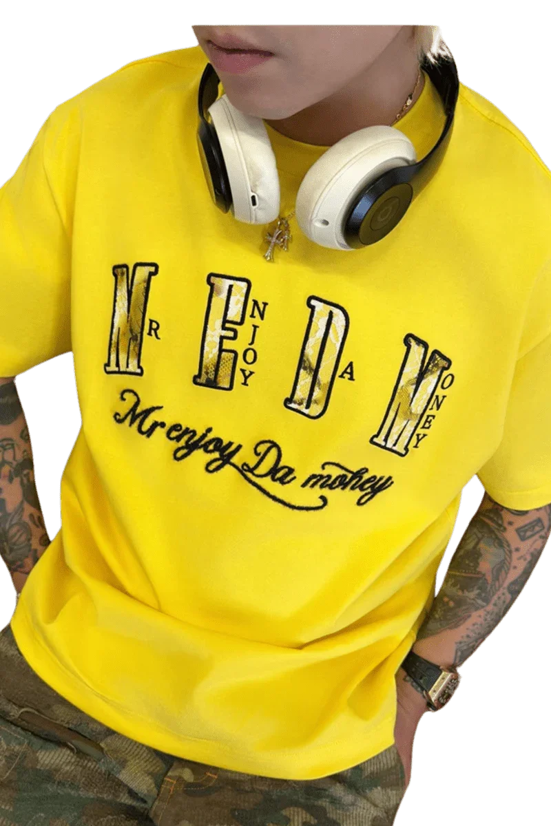 Yellow MEDM Burnt Laced Tee by Mr Enjoy Da Money worn with headphones and camo pants