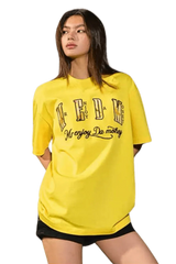 Yellow MEDM Burnt Laced Tee by Mr Enjoy Da Money worn by model with black shorts