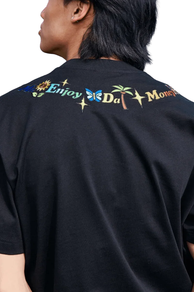 Back view of black MEDM Butterfly Necklace Embroidery Tee by Mr Enjoy Da Money with colorful embroidered text and symbols